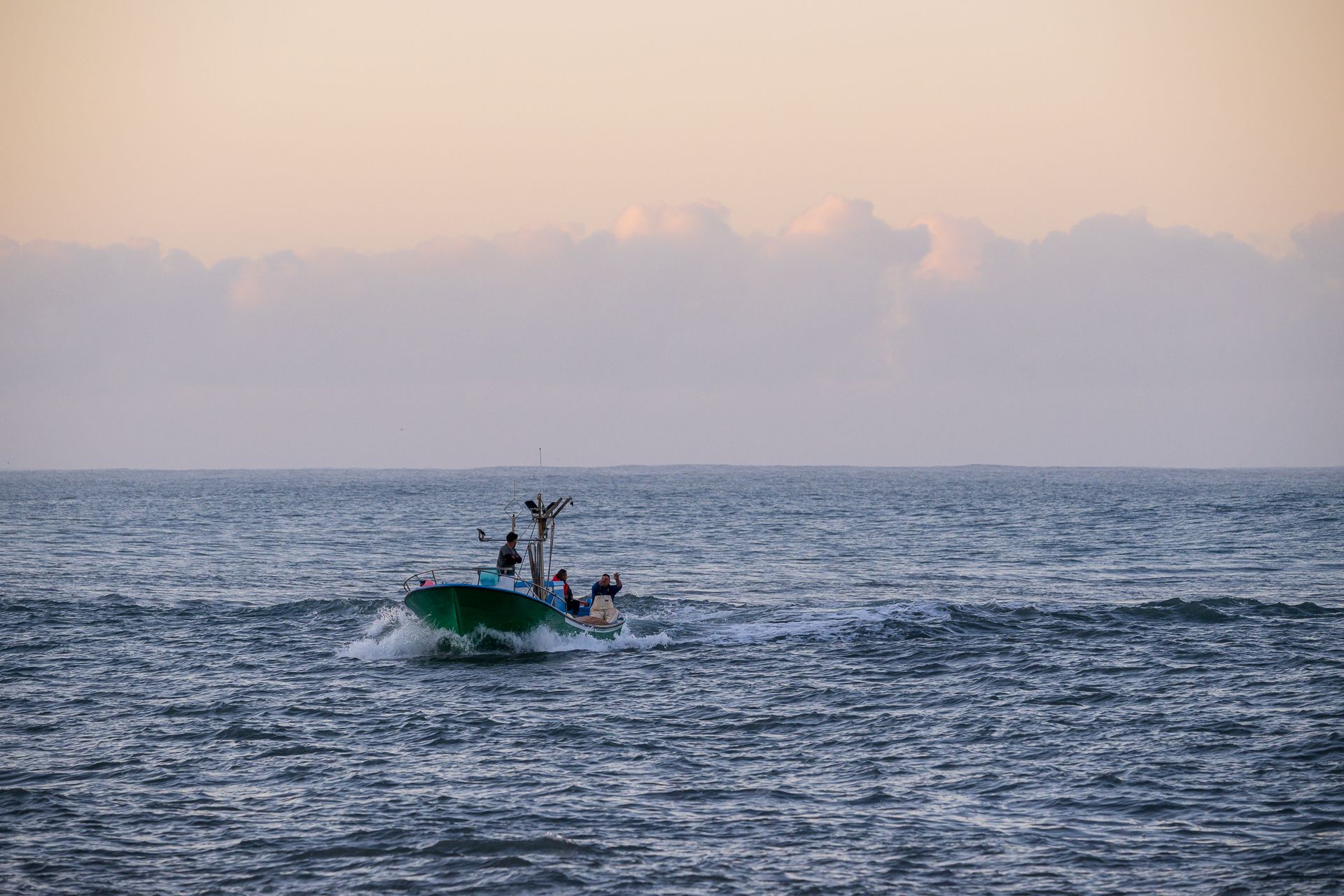 Fischer vor dem Hafen
