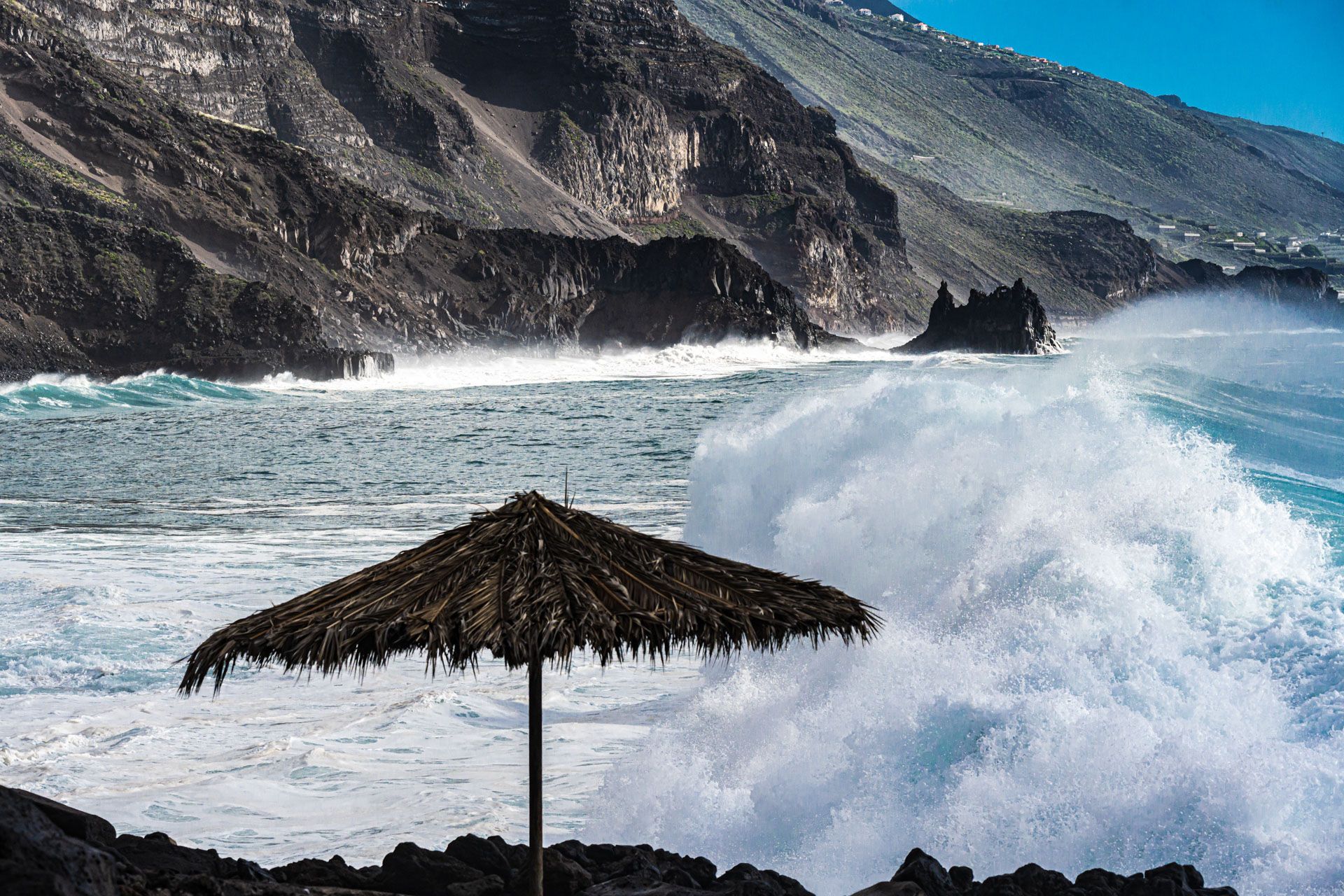 Welle mit Sonnenschirm